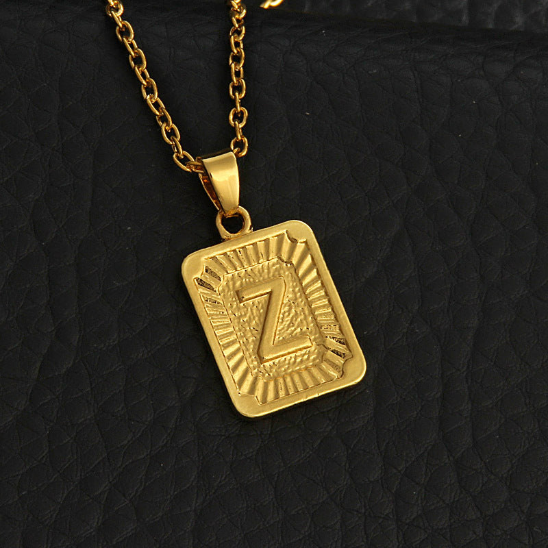 Gold letter necklace