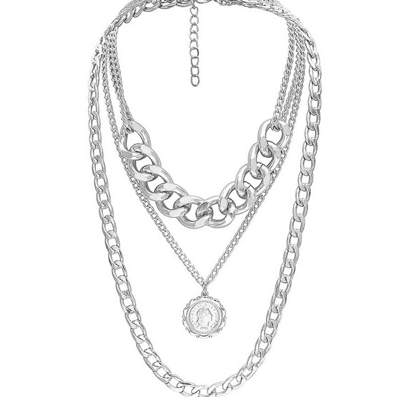 Queen embossed pendant